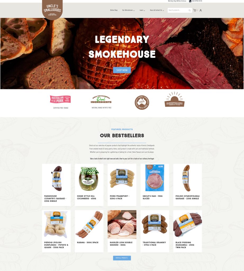 Screenshot of a deli website featuring smoked meats. The header shows various meats with the text “Legendary Smokehouse.” Below are images of bestselling sausages, hams, and deli meats for sale. Opdee Digital Marketing