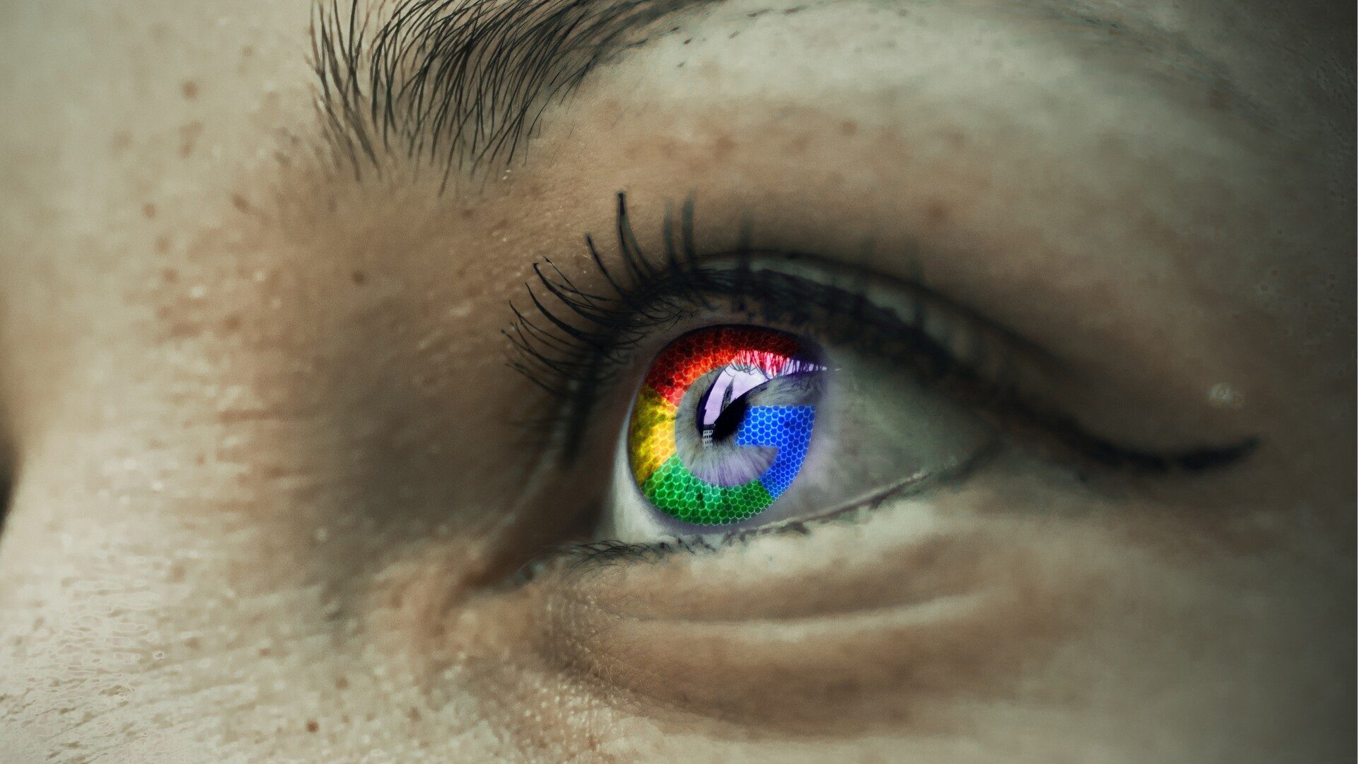 Close-up of a person's eye with the Google logo, in its signature red, yellow, green, and blue colors—digitally reflected in the iris—capturing the experience of businesses engaging with Google Ads. Eyelashes and skin texture are clearly visible. Opdee Digital Marketing